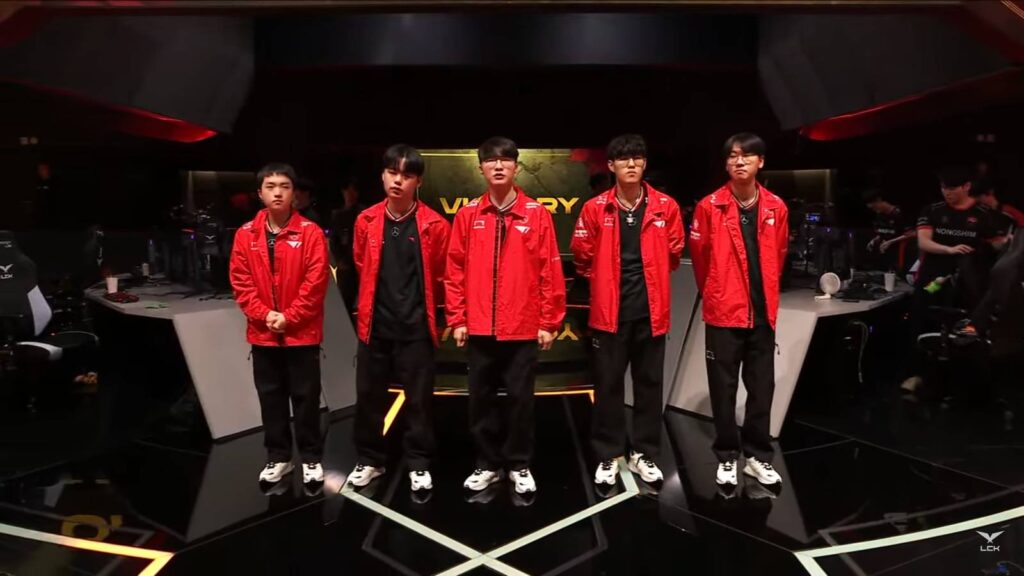 It’s a photo of the LoL esports pro players from the team T1 after their match vs NS RedForce in the LCK Cup 2025 Play-in.