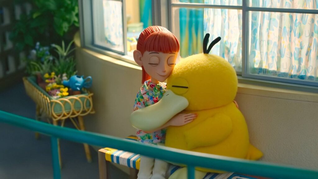 Haru and Psyduck hugging in Pokemon Concierge