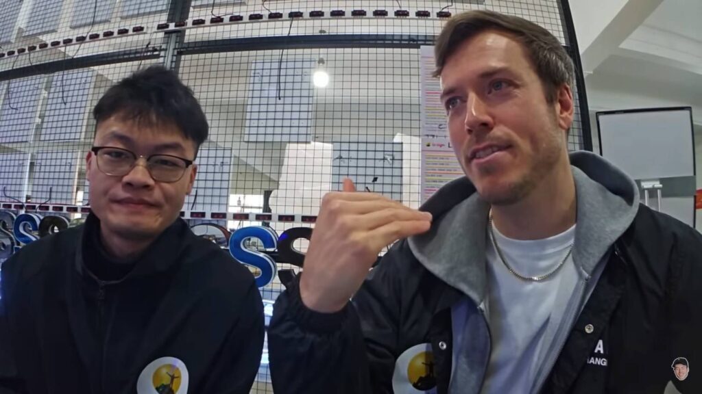 It’s a screenshot from a video by jakenbakeLIVE about Tony LC Sign: It features Tony and the video host Jake.