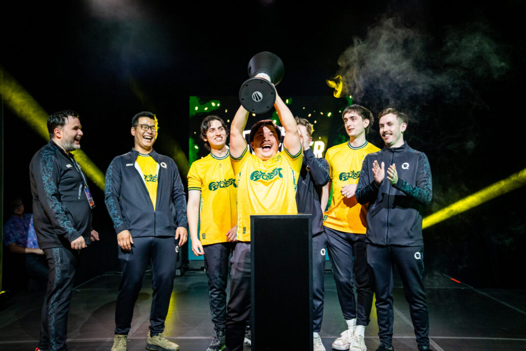 FlyQuest celebrates a win at ESL Challenger Atlanta 2024, lifting the trophy.
