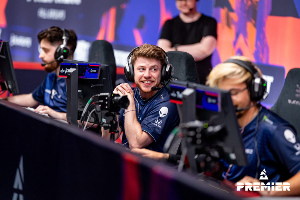 jks sits grinning after a won round at a BLAST CS2 tournament.