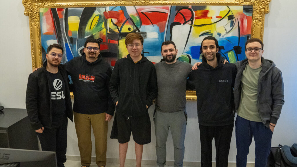 Miracle stands with his Nigma Galaxy Dota 2 teammates.