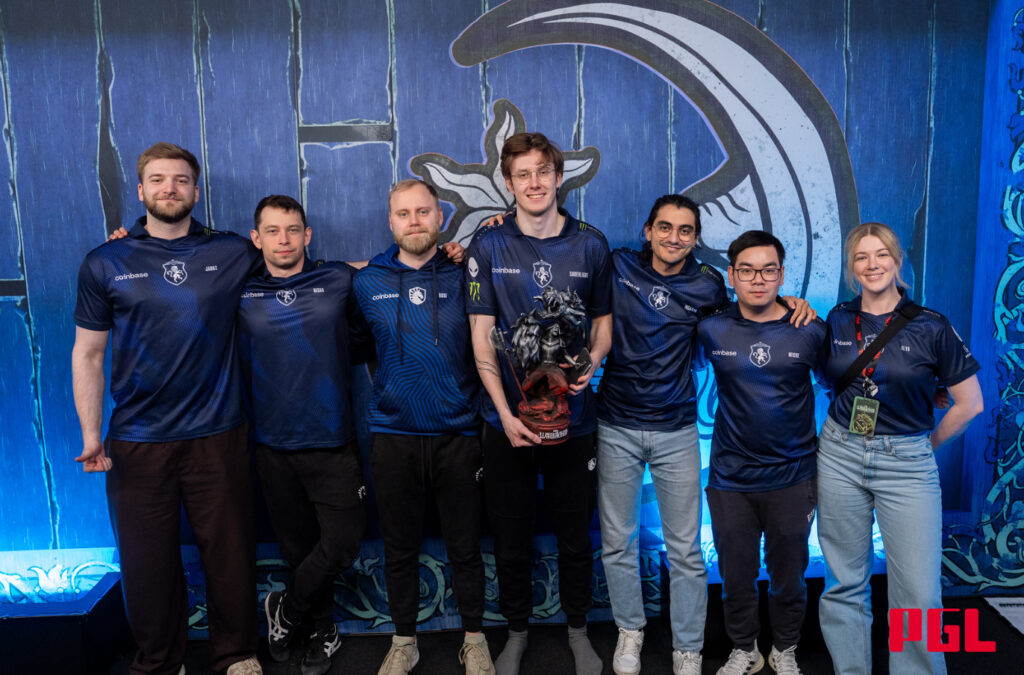 Team Liquid stands with the PGL Wallachia trophy after their Season 3 win.