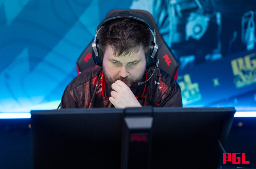 Snax sits concerned while playing CS2 at PGL Astana.