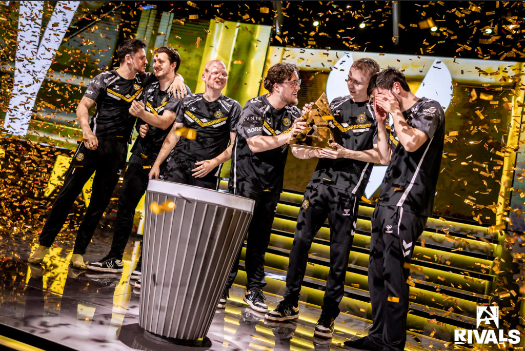 Vitality celebrates after winning the BLAST Rivals Spring 2025 tournament, lifting the trophy as confetti rains down.
