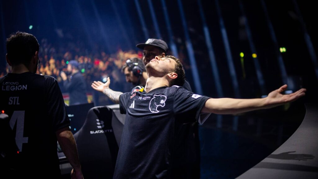 It's a photo of the Rocket League esports team FURIA at the RLCS 2025 Birmingham Major: the players enjoya good match result