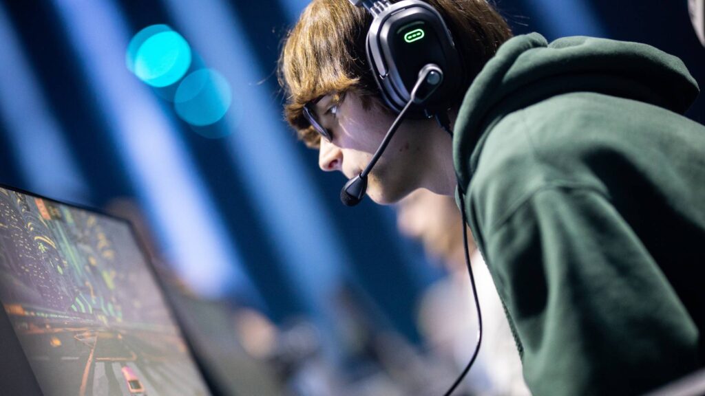 It's a photo of the Rocket League esports player Daniel from the team NRG at the RLCS 2025 Birmingham Major: he's focused on the game.