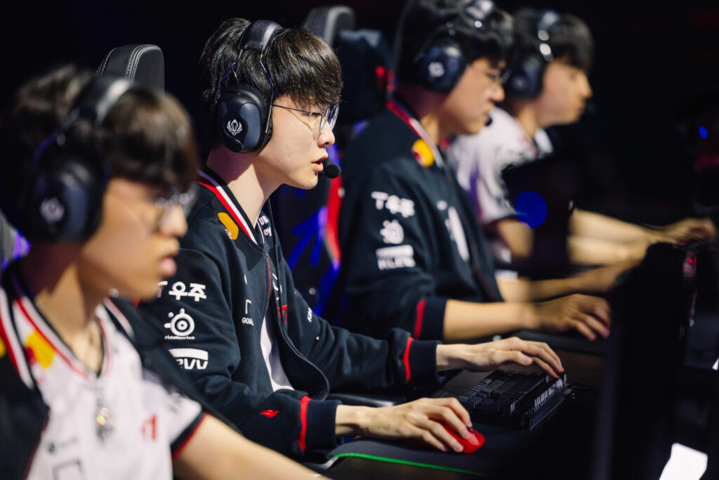 It’s a photo of the LoL esports players from the team T1 during the tournament MSI 2025 - the Brackets Stage Round 1 match vs CFO.