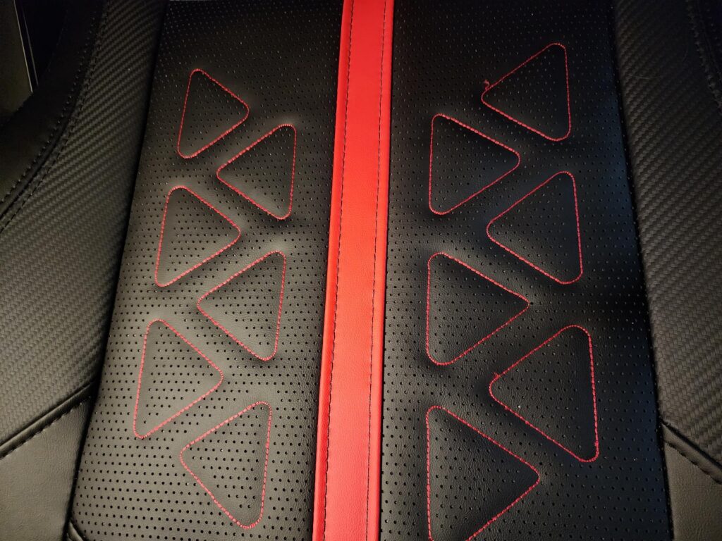 The seat has holes to accommodate heating and cooling features. (Photo via esports.gg)