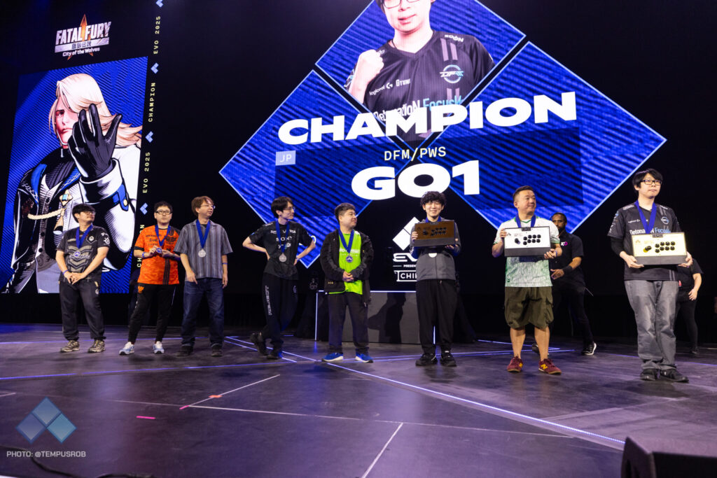 The top 8 players from the esports tournament FATAL FURY: City of the Wolves at Evo 2025 - a photo from the stage.