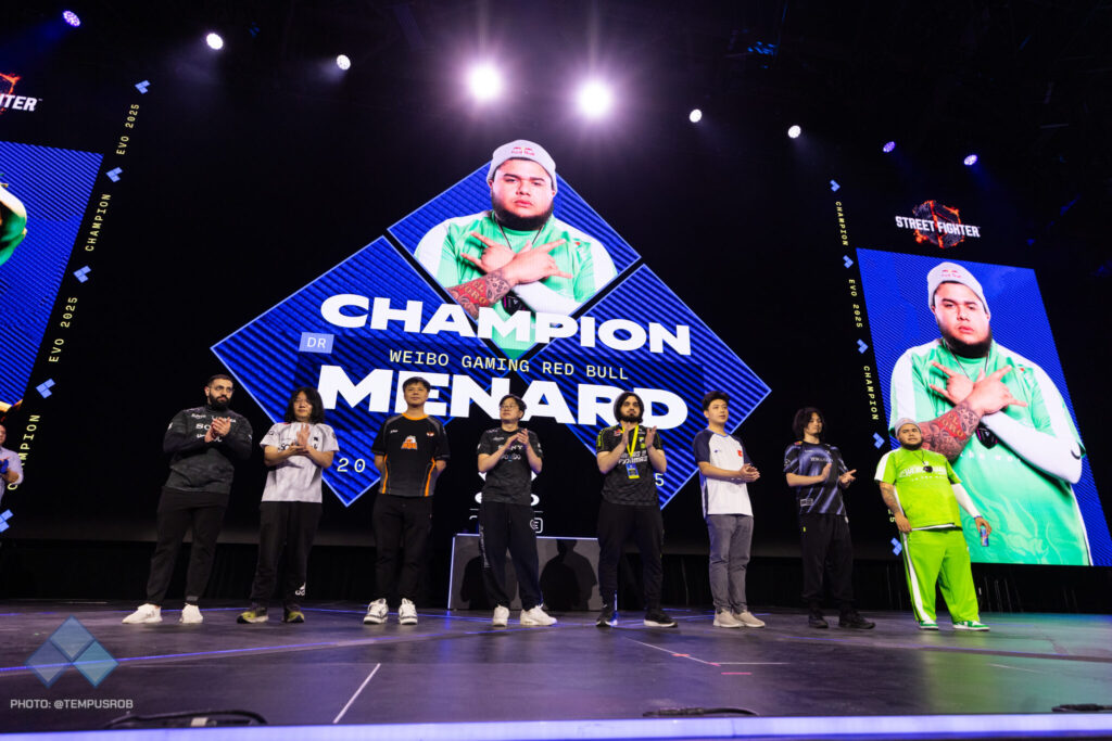 It's a photo of Street Fighter 6 esports players at the event Evo 2025 - they are standing on the stage.