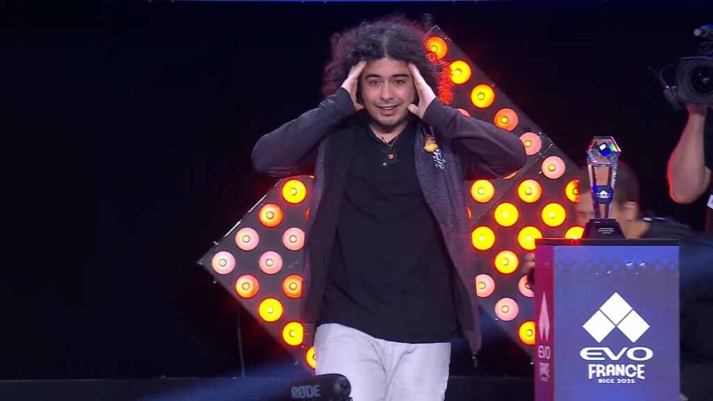 It's a photo of the Guilty Gear Strive esports player Tiger_Pop after winning Evo France 2025.