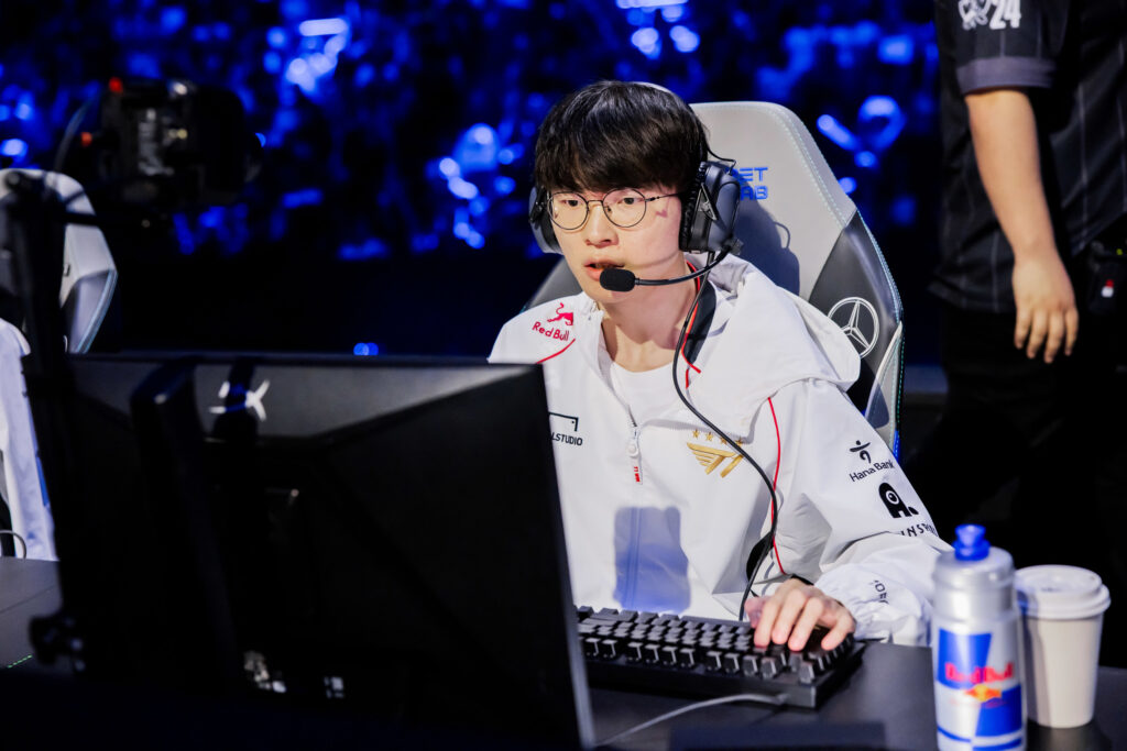 It's a photo of the LoL esports player Faker from the team T1 at the tournament League of Legends Worlds 2024.