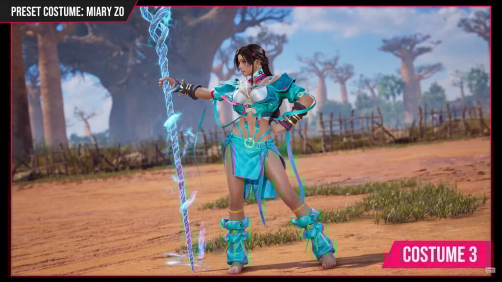 Miary Zo wearing her turquoise Costume 3 and holding her staff