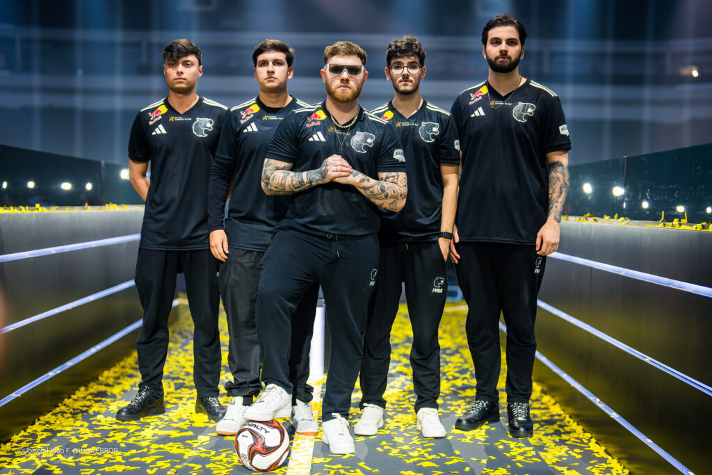 It's a photo of the Rainbow Six Siege X esports players from the team FURIA after winning the event RE:LO:AD 2025.