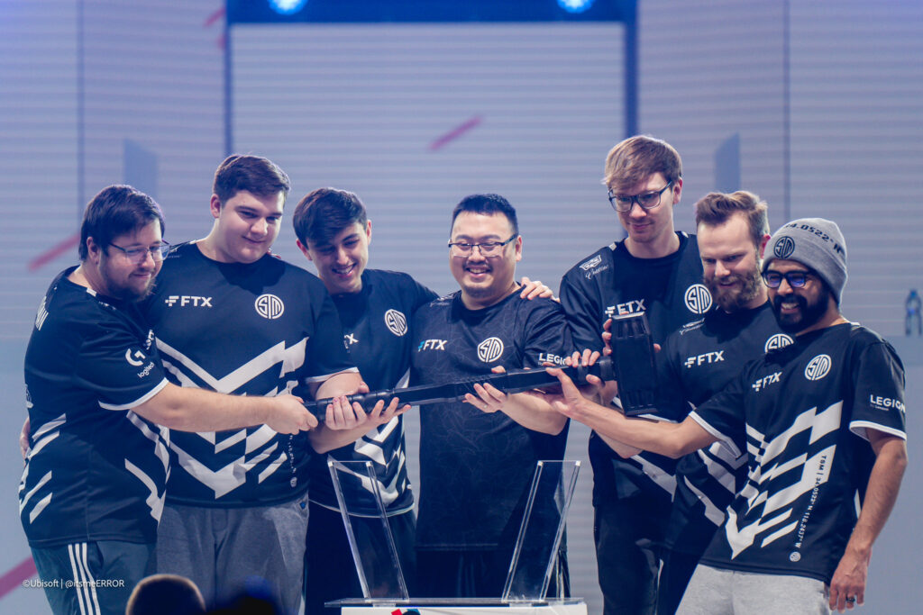 It's a photo of the R6 Siege players from the Team TSM after winning the esports event Six Invitational 2022.