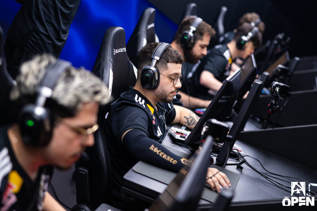 The photo features CS2 esports players from the team FURIA competing on the stage of Open Spring 2025.