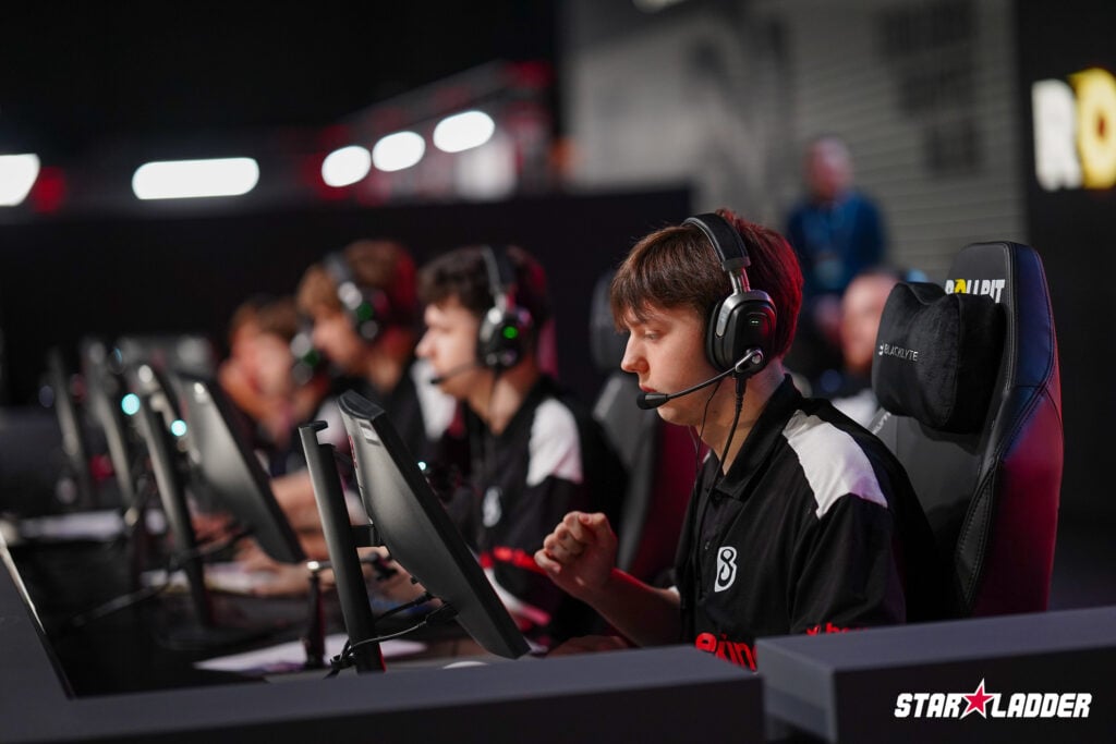 The photo features Counter-Strike players from the team B8 during a match at the CS2 esports StarLadder Budapest Major 2025.