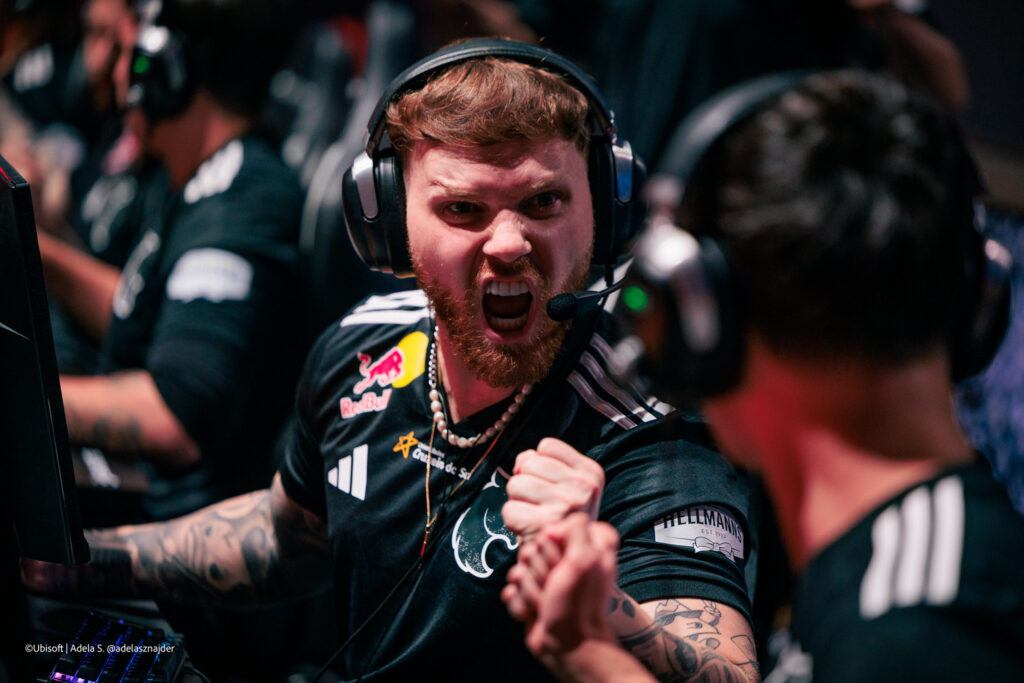 It’s a photo of the R6 Siege pro players from the team FURIA during the grand final of the RE:L0:AD esports event.