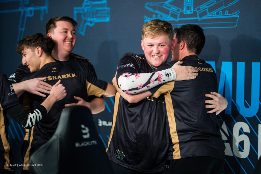 Rainbow Six Siege X esports players from the team Wildcard hug after qualifying for the Playoffs at R6 Munich Major 2025 - a photo.