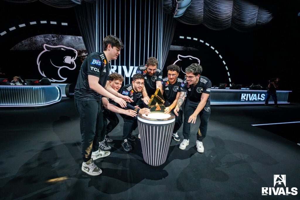 The photo of the CS2 players from the team FURIA during the esports tournament BLAST Rivals Fall 2025 - they lift the trophy.