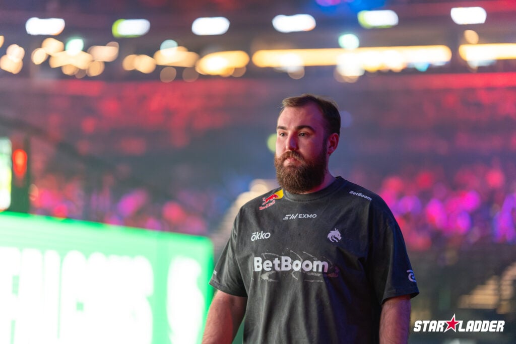 It’s a photo of the CS2 player chopper from Team Spirit at the StarLadder Budapest Major 2025 - he walks in the esports arena.