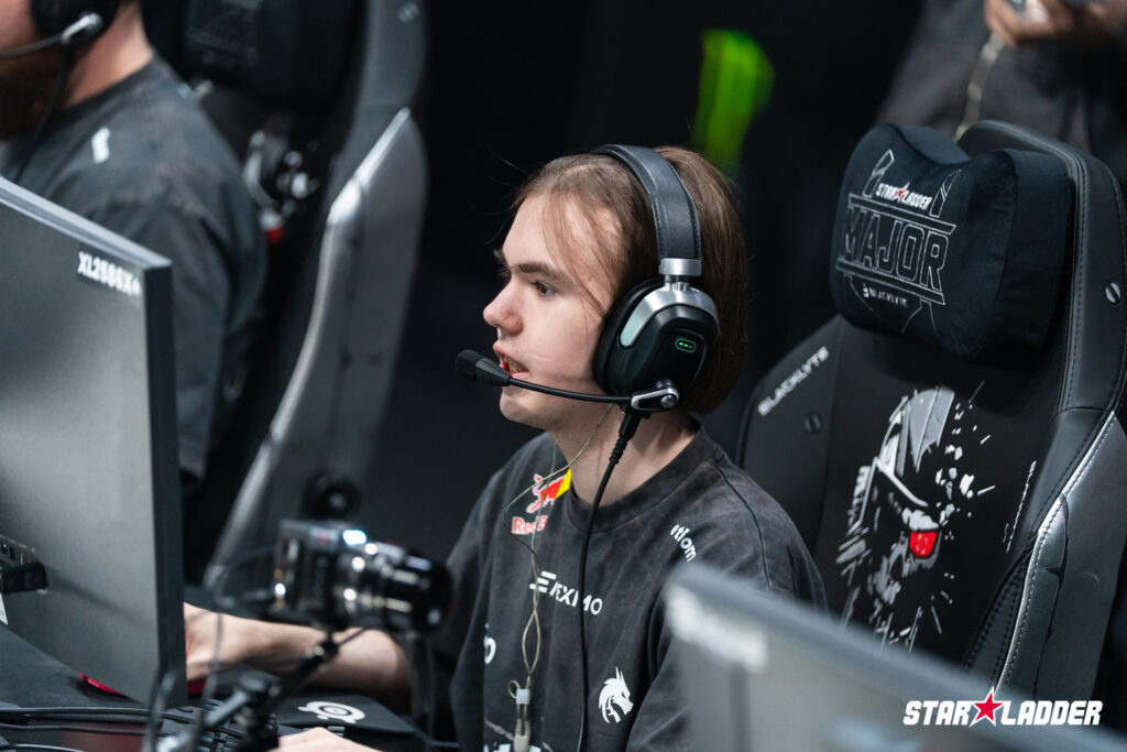 It’s a photo of the CS2 player donk from Team Spirit at the StarLadder Budapest Major 2025 - he competes on a computer.