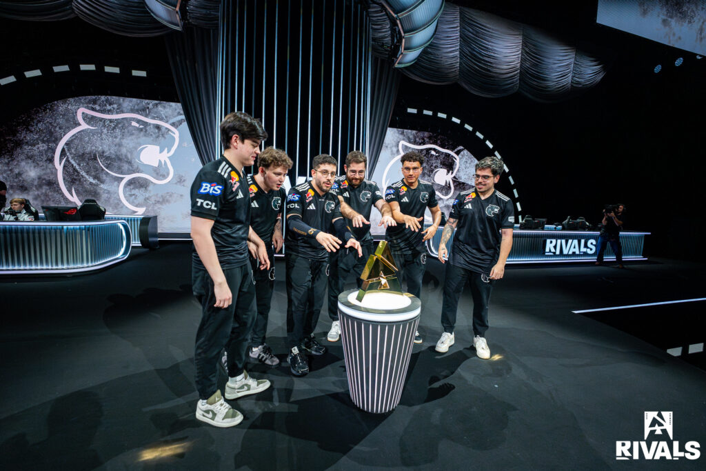 The photo features CS2 esports players from the team FURIA with the trophy of the tournament BLAST Rivals Fall 2025 in Hong Kong.