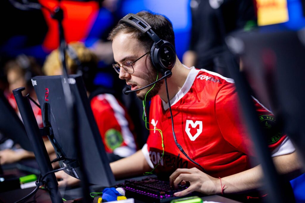 It’s a photo of the CS2 esports player xertioN from the team MOUZ during the tournament IEM Cologne 2025.