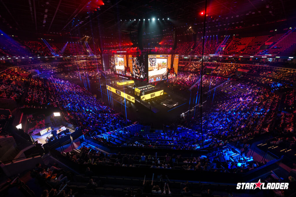 The photo features the Counter-Strike 2 esports arena during the StarLadder Budapest Major 2025 - NAVI and FURIA play on Mirage.