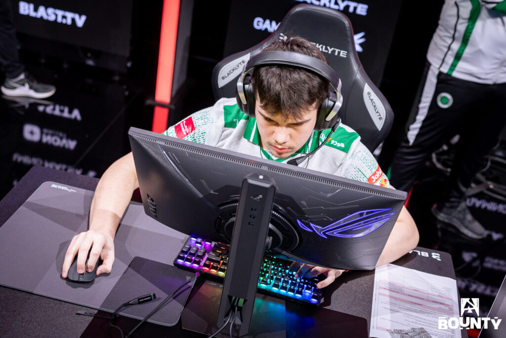 The CS2 esports player Matej "Nucleonz" Trajkoski as a replacement at the Counter-Strike 2 tournament BLAST Bounty Winter 2026 — it’s a photo from the event, the person in front of his computer.