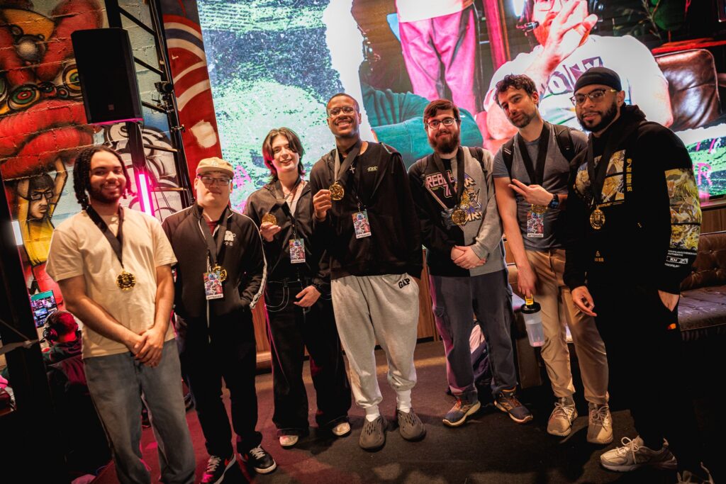 
The photo of fighting games players in the top 8 of the 2XKO esports tournament DIY: Bonus Track - including Diaphone in the top 3.