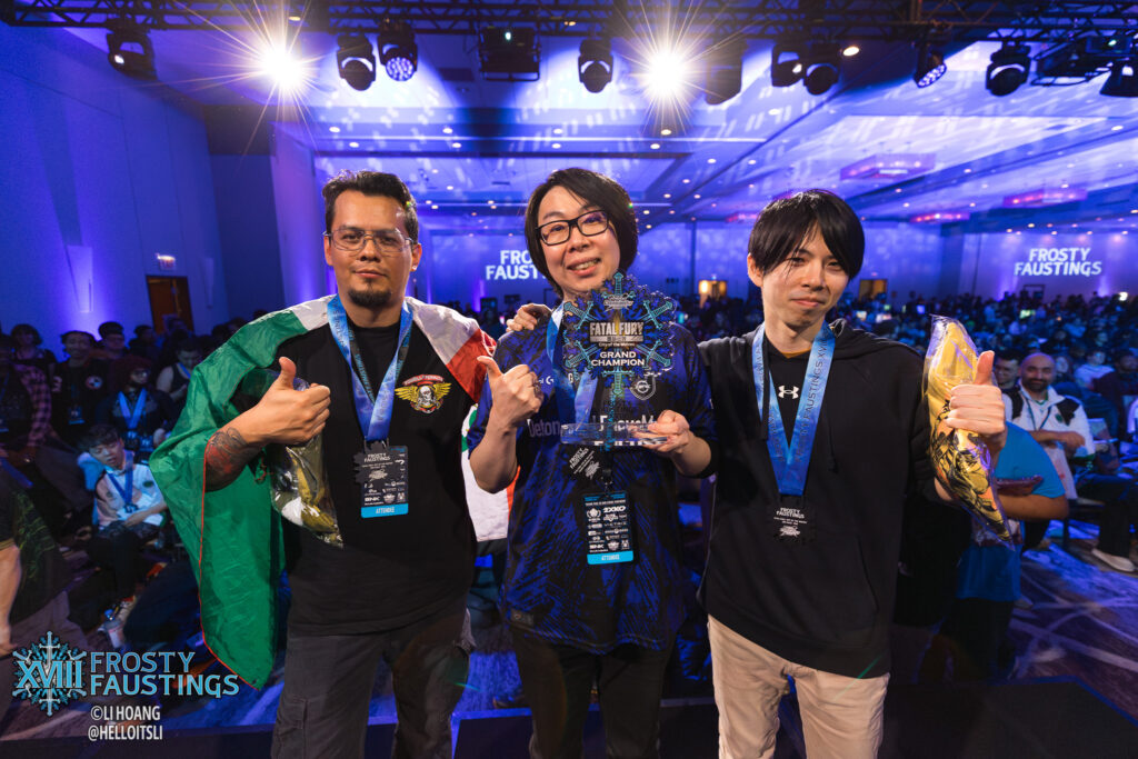 It’s a photo of the top 3 FATAL FURY players at the fighting games esports event Frosty Faustings XVIII.