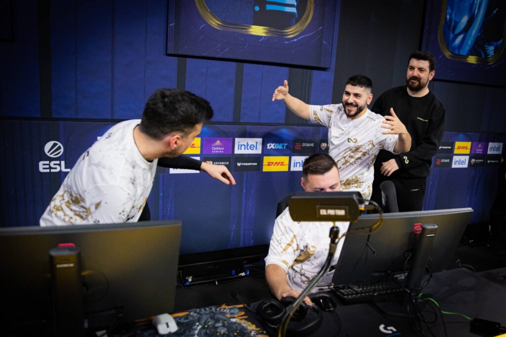 The photo features the CS2 players from the team Aurora Gaming at the Counter-Strike 2 esports tournament IEM Katowice 2025.