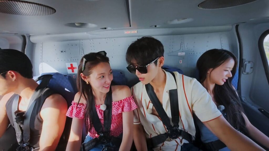 The screenshot from the Netflix show Single’s Inferno Season 5 - episode 8, four couples in a helicopter and an uneasy situation.