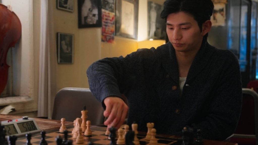 It’s a screenshot from the Korean reality show Single’s Inferno Season 5: the image shows one of the contestants, Lee Sung-hun playing chess.