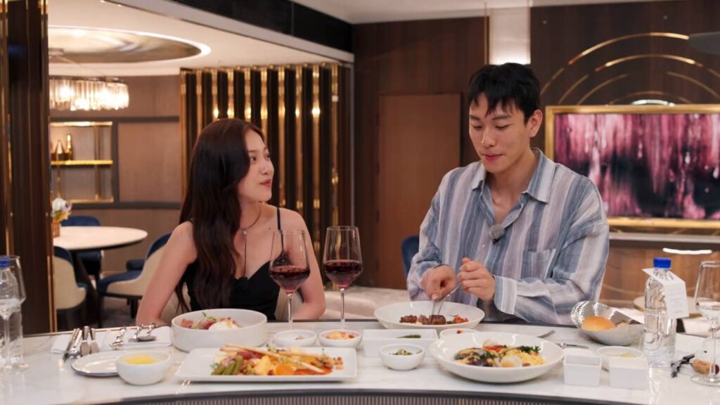 Two participants of the show Single’s Inferno Season 5 during their episode 3 Paradise dinner, Kim Jae-jin and Lee Joo-young.