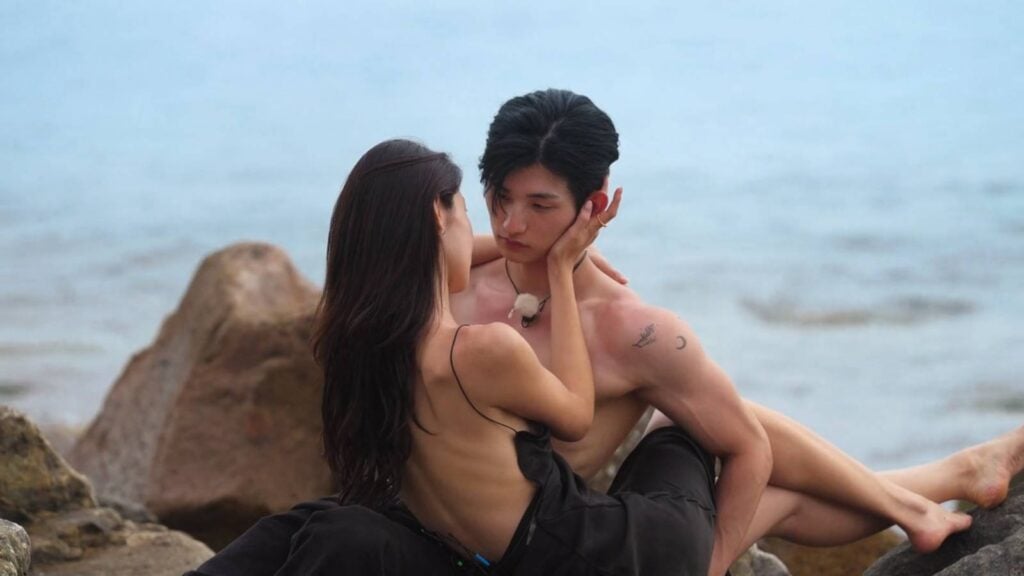 The image shows Choi Mina Sue and Lee Sung-hun during an expressive photoshoot in Single’s Inferno Season 5 episode 4. 