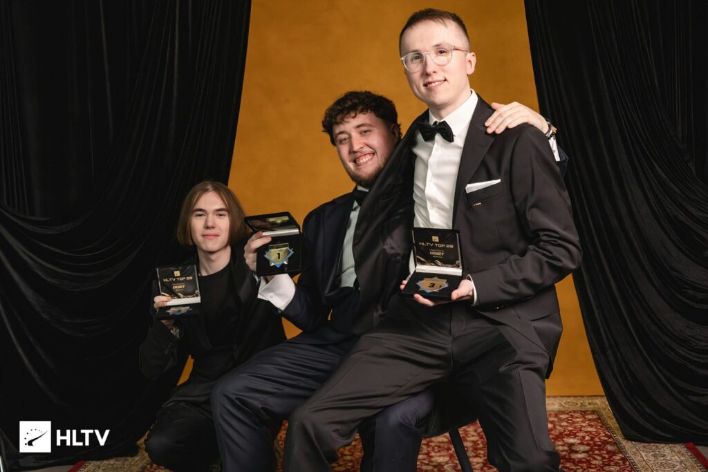 Three CS2 esports players with their HLTV Awards 2025 trophies: ZywOo, ropz, and donk.