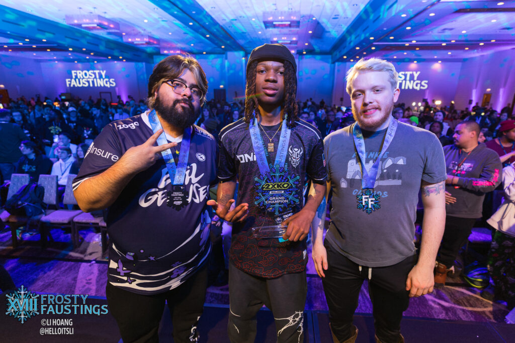 It’s a photo of the 2XKO players Supernoon, bleed, and Globo - they finished in the top 3 at the esports tournament Frosty Faustings 2026.