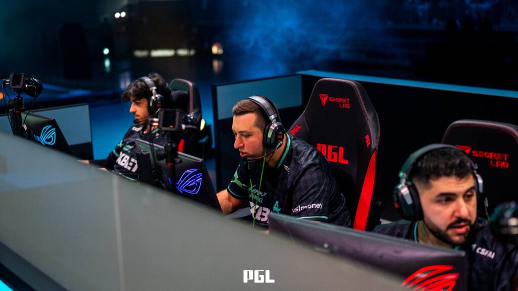 It’s a photo of Counter-Strike 2 players from the team Aurora Gaming during the Playoffs at the CS2 esports tournament PGL Cluj-Napoca 2026 — in front of monitors during a match on the stage.