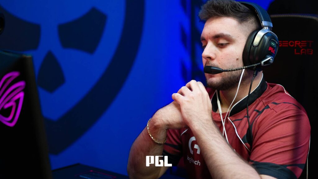 It’s a photo of Counter-Strike 2 player Matúš "matys" Šimko from the team G2 Esports during the Swiss Stage of the CS2 tournament PGL Cluj-Napoca 2026 — in front of a monitor, a bit disappointed during a match.