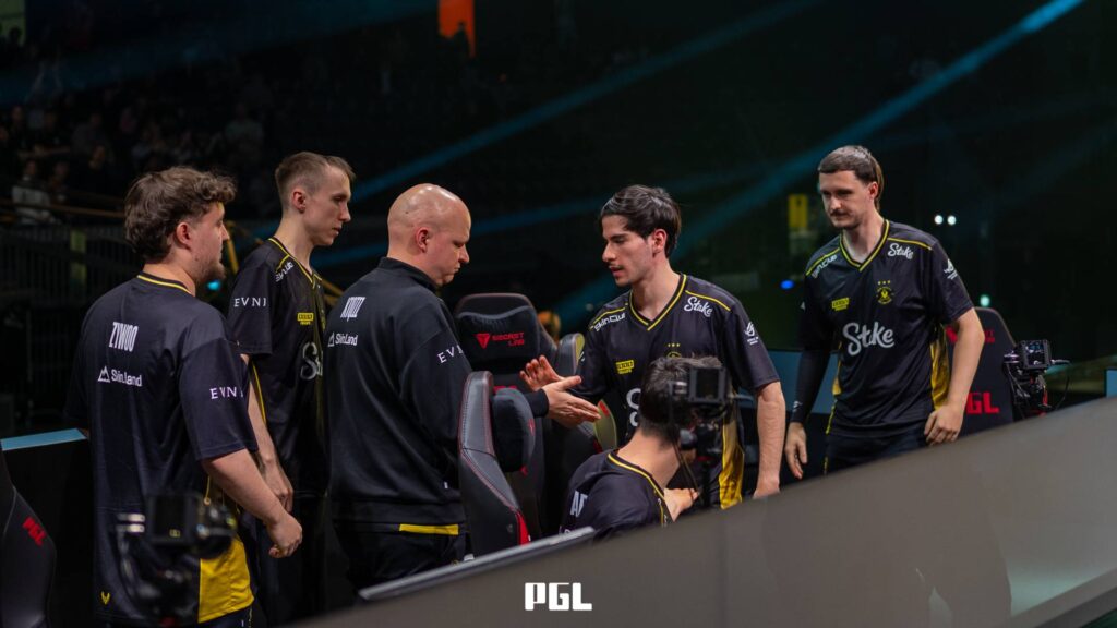 It’s a photo of Counter-Strike 2 players from Team Vitality during the Playoffs at the CS2 esports tournament PGL Cluj-Napoca 2026 — greeting each other on the stage after winning a match.