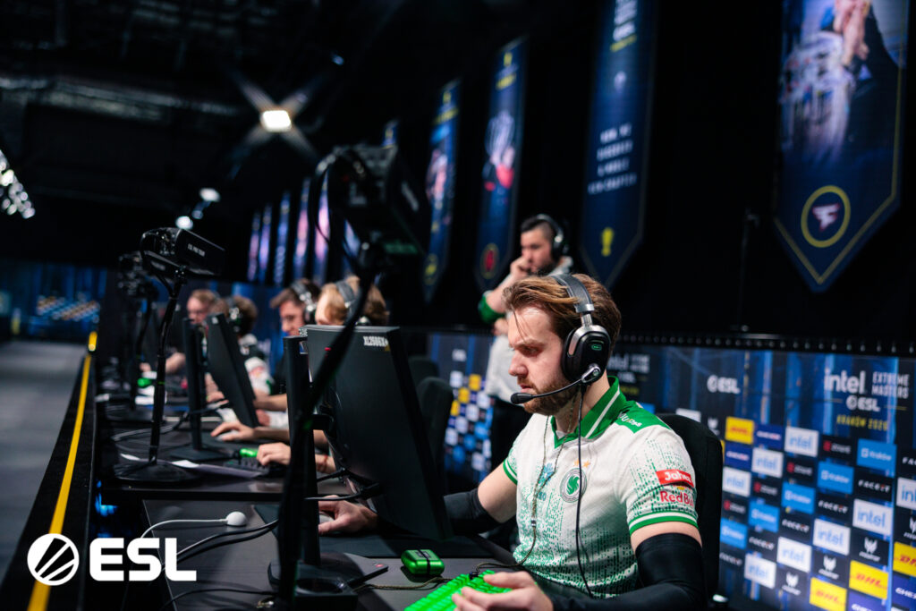 It’s a photo of the CS2 players from Team Falcons during the esports tournament IEM Kraków 2026: in front of their computers during an on-stage match.