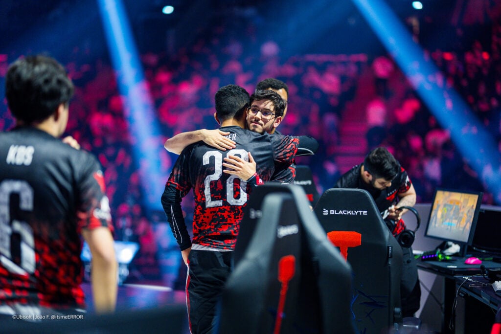 The Rainbow Six Siege X players from FaZe Clan hug after winning a map in the grand final of the esports tournament Six Invitational 2026.