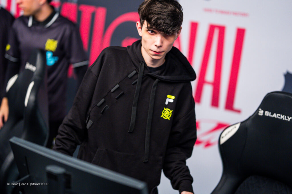 The Rainbow Six Siege X pro players from the team Ninjas in Pyjamas during the Playoffs stage at the esports tournament Six Invitational 2026 — a photo, somewhat sad while packing the equipment after a match.