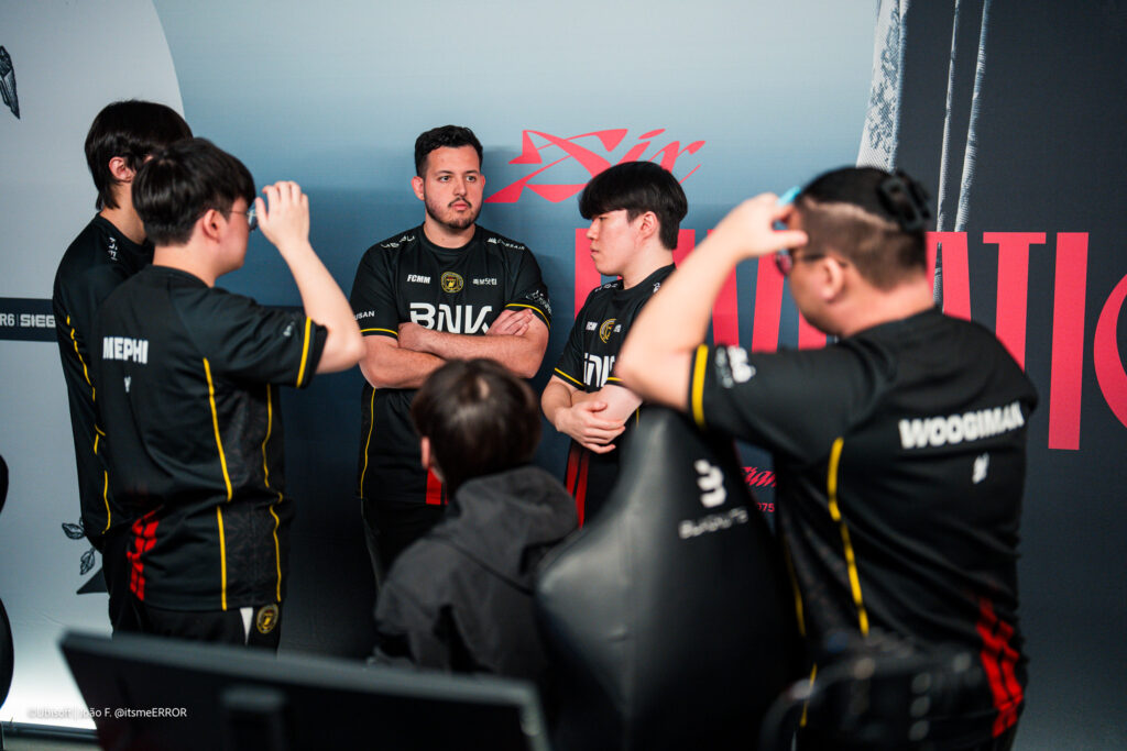 The photo features the R6 Siege X esports players from the team Black Dragons during the Group Stage at the world cup event, Six Invitational 2026.