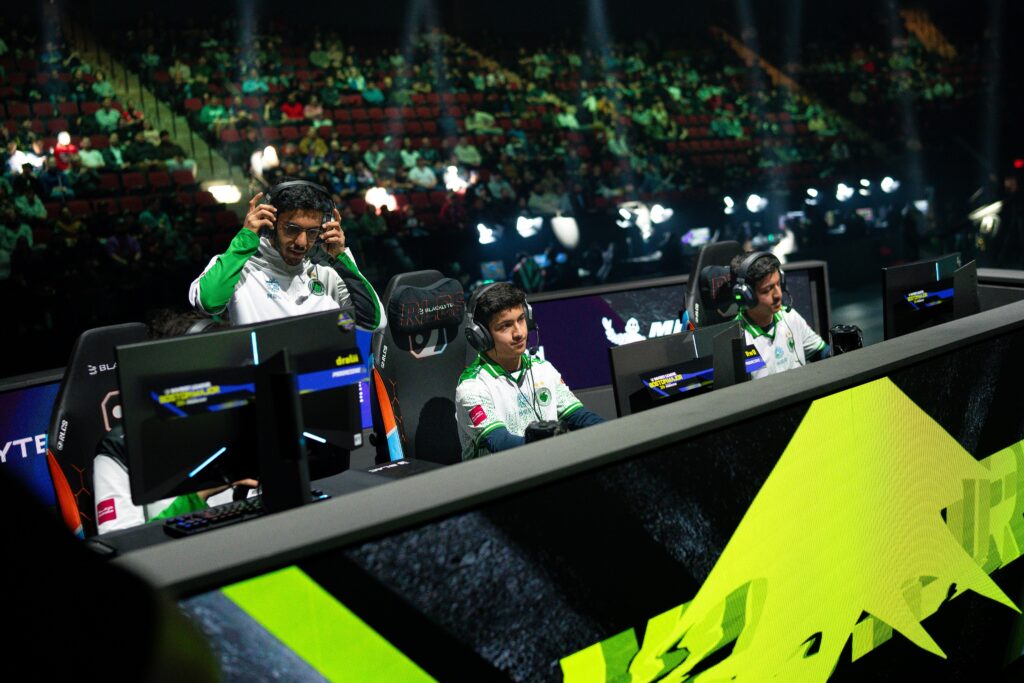 It’s a photo of the Rocket League esports players from Team Falcons: on the stage of the tournament RLCS 2026 Boston Major, competing during the quarterfinal against Shopify Rebellion.