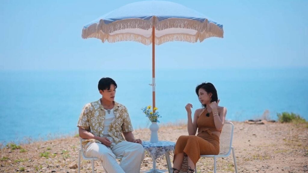 The image features two participants of Single’s Inferno Season 5: Shin Hyeon-woo and Kim Go-eun on the inferno island.