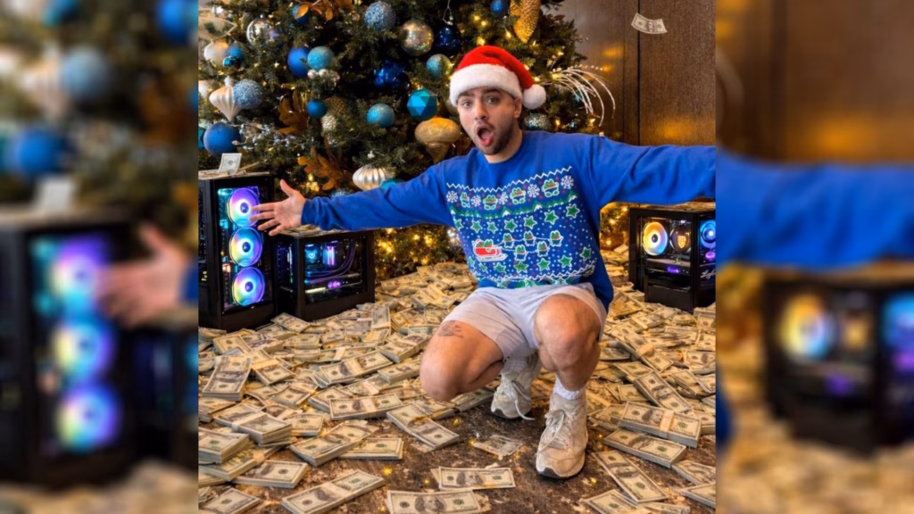 The image is a photo of the streamer Mizkif - in front of the Christmas tree, surrounded by dollar bills on the floor.